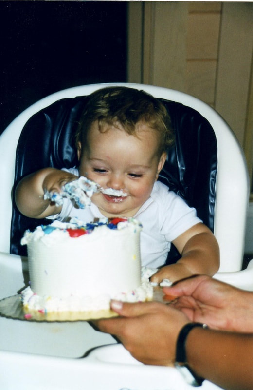 Jaxson with a Birthday Cake